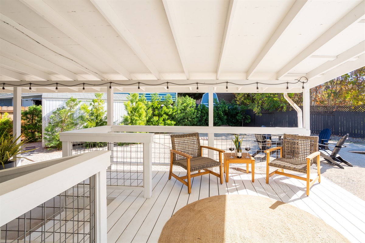 Side porch lounge area that's perfect for morning coffee or afternoon wine.