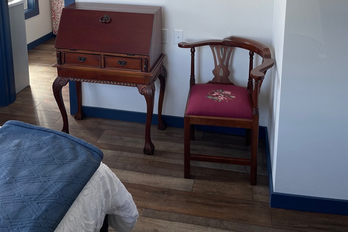 Genuine secretary desk & corner sitting chair.