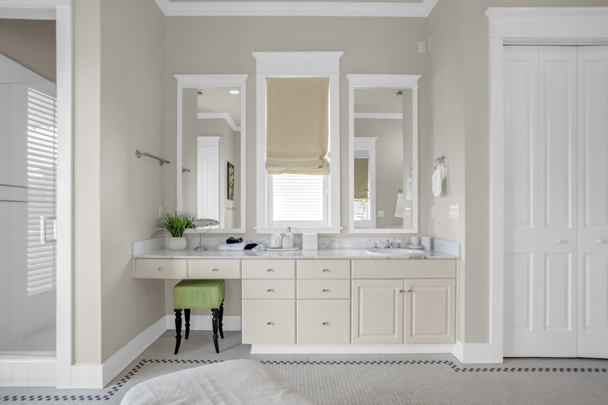 2nd floor king bedroom ensuite bathroom with double vanity, tub and shower.