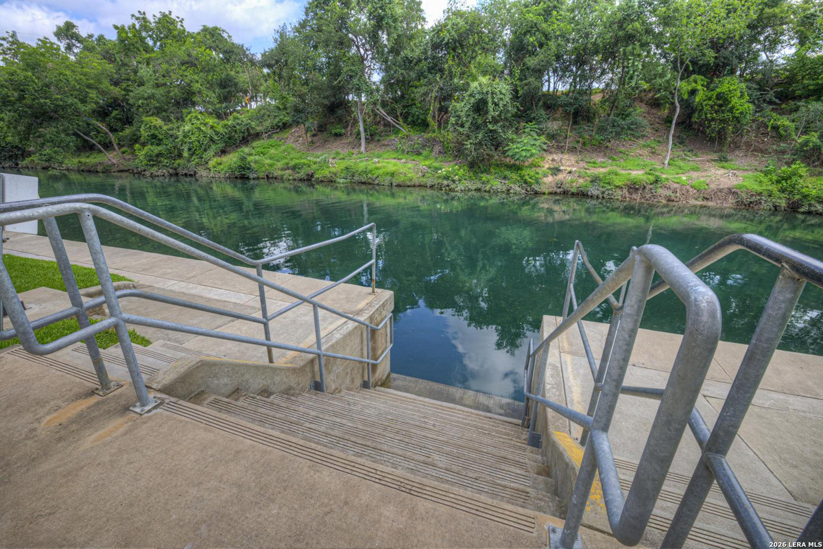 Bulkhead stairs lead you right into the Comal River.