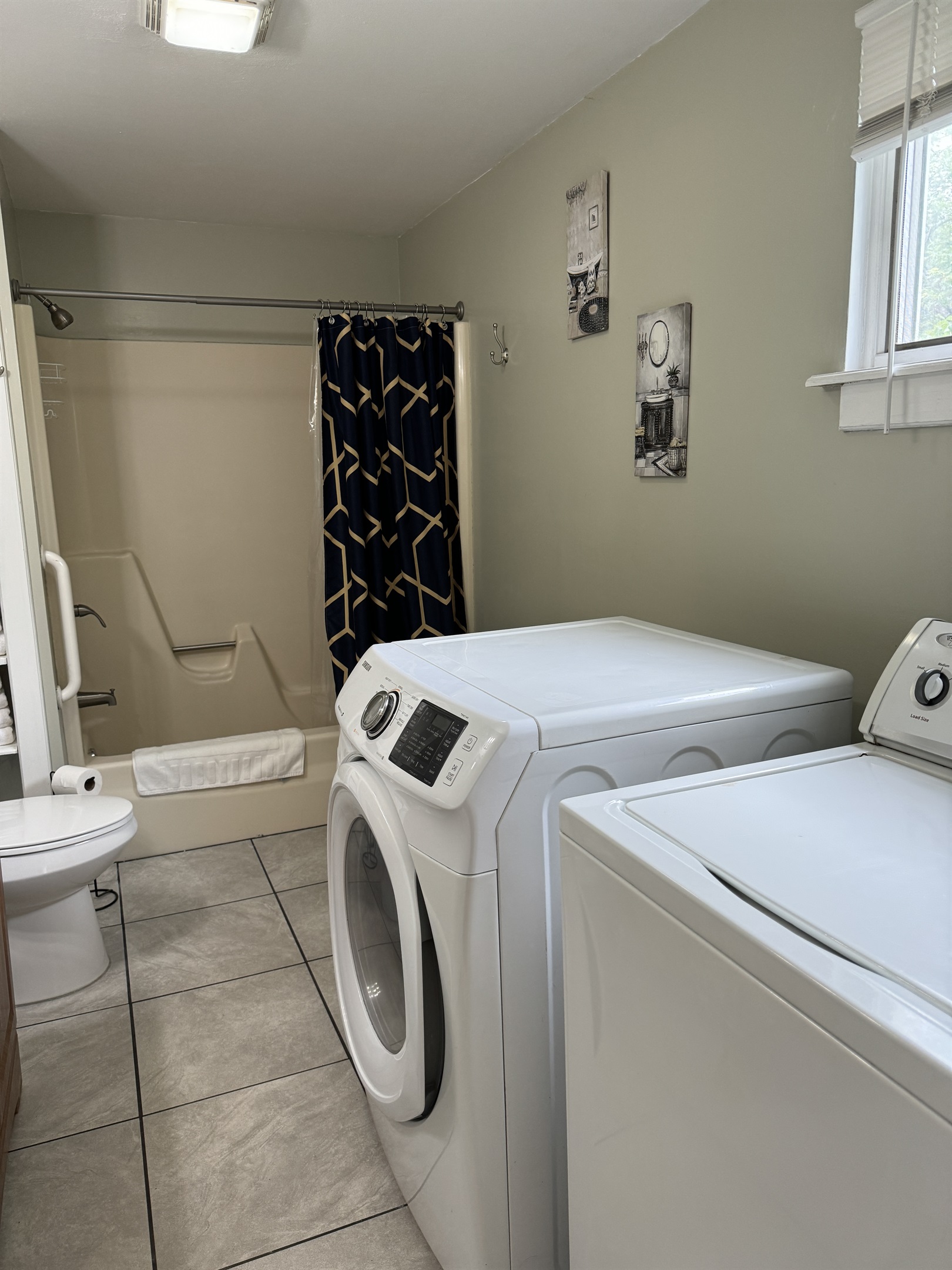 1st floor bath with tub/shower and laundry