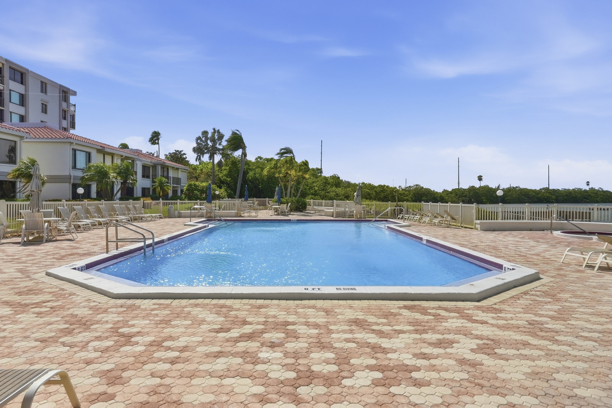 Take a refreshing dip or relax poolside at the community pool, a perfect place to soak up the Florida sunshine and enjoy a laid-back afternoon.