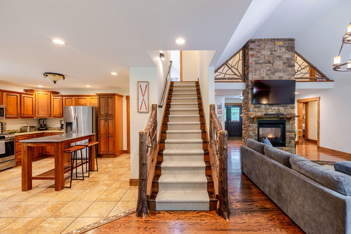Open layout connects the great room, kitchen, and staircase, making it perfect for entertaining.