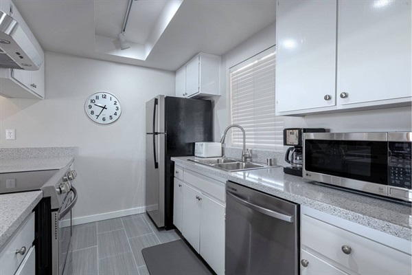 Kitchen with full-sized appliances and all you need to whip up meals and snacks