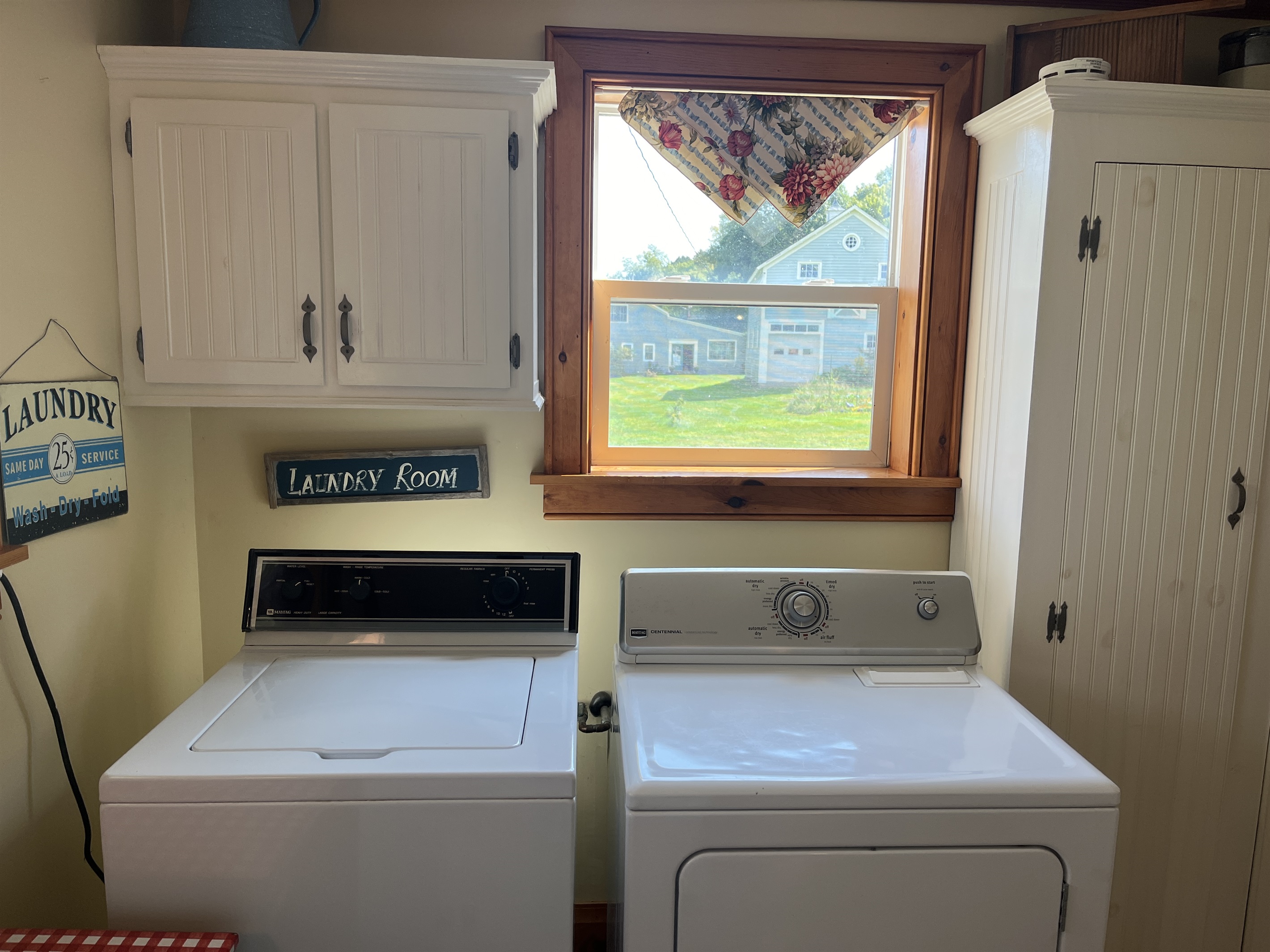 Launrdy area between kitchen and bathroom