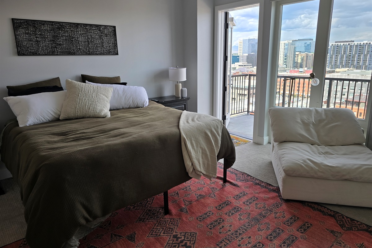 King size bed, extra seating area, private balcony with seating.
