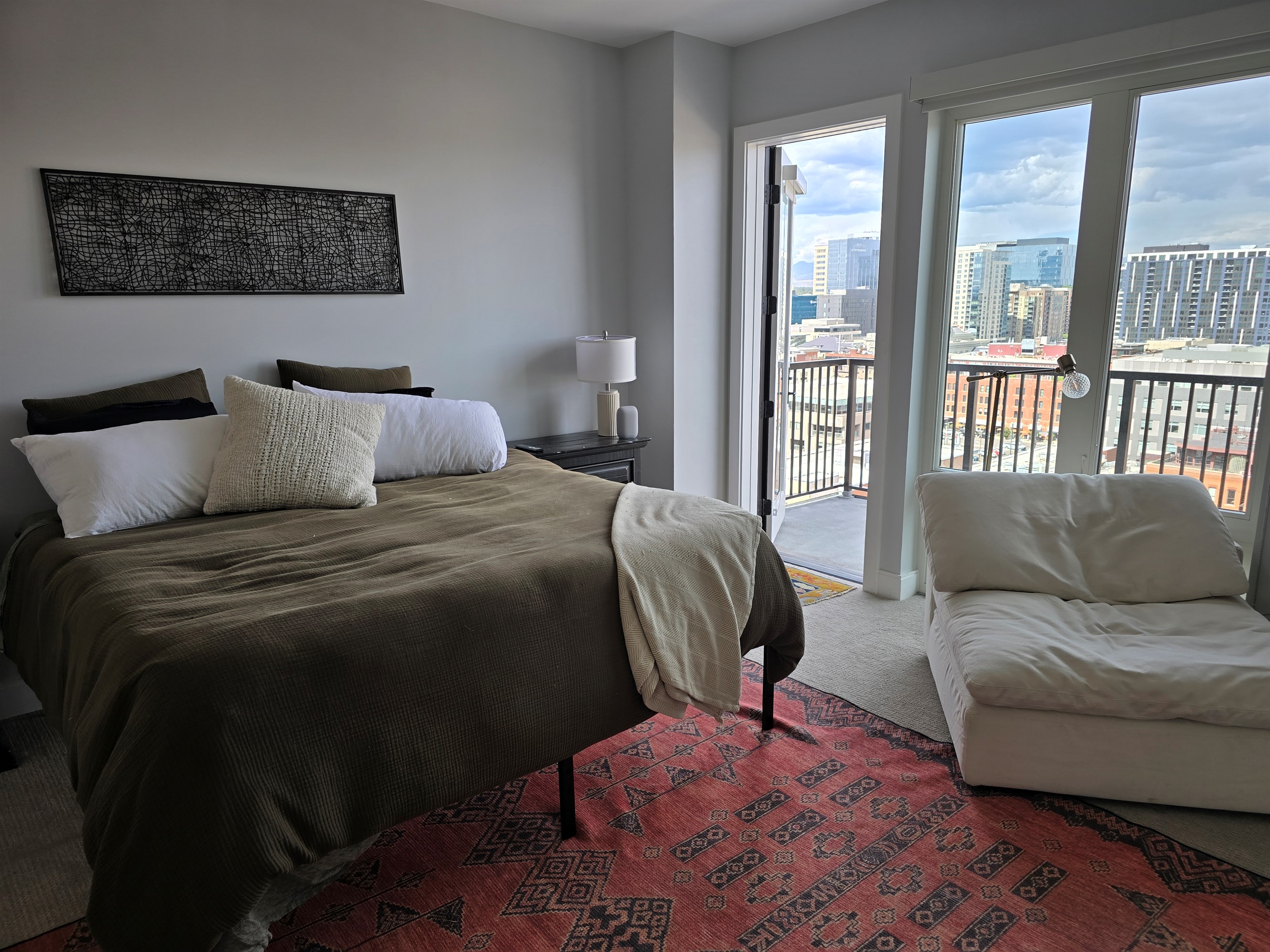 King size bed, extra seating area, private balcony with seating.