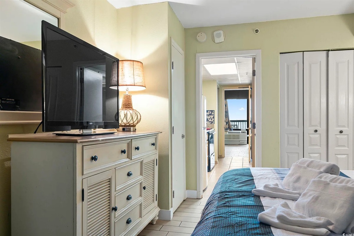 Relax in comfort with soft linens and a calm coastal vibe