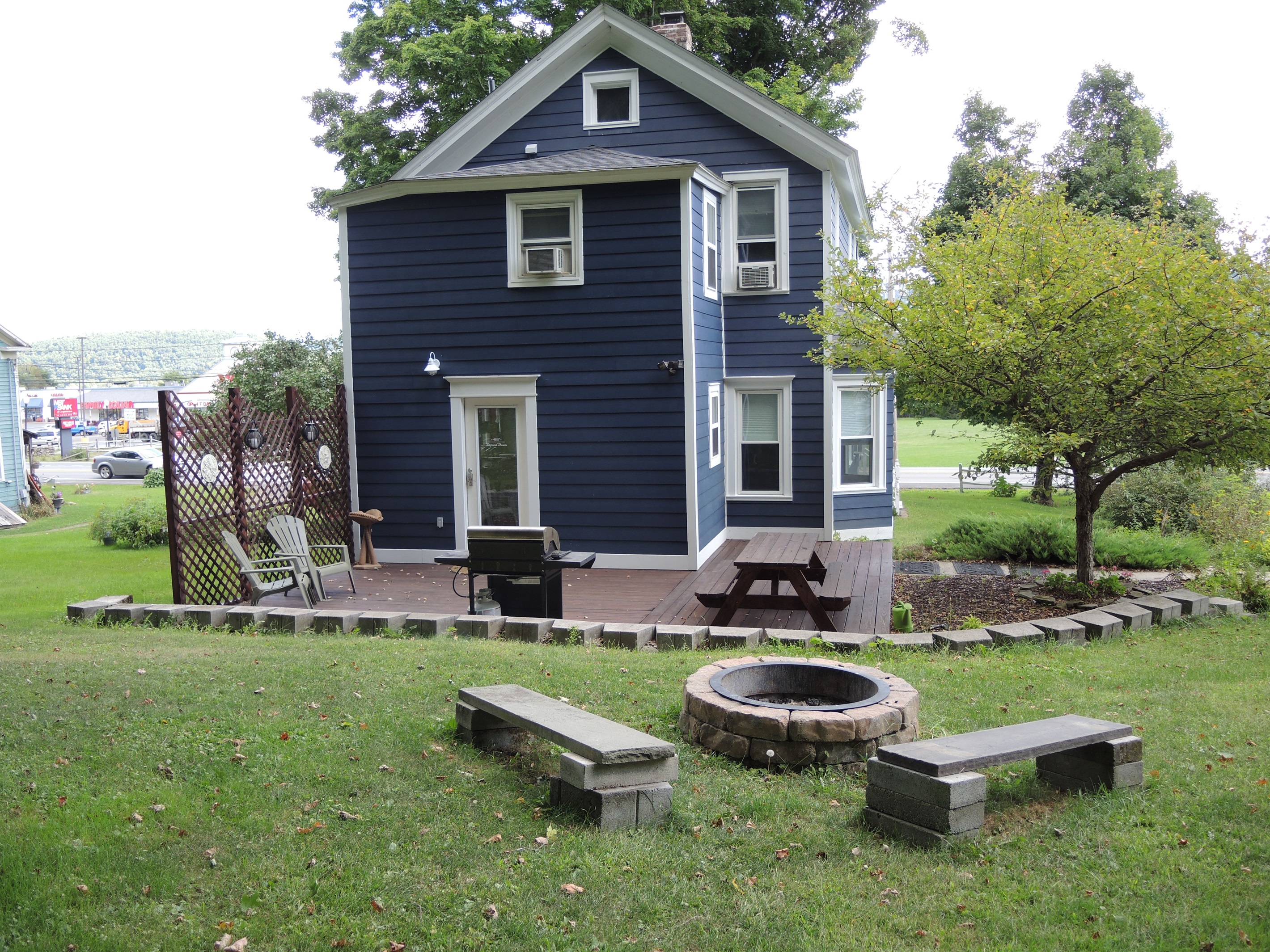 Fire pit area behind the house.