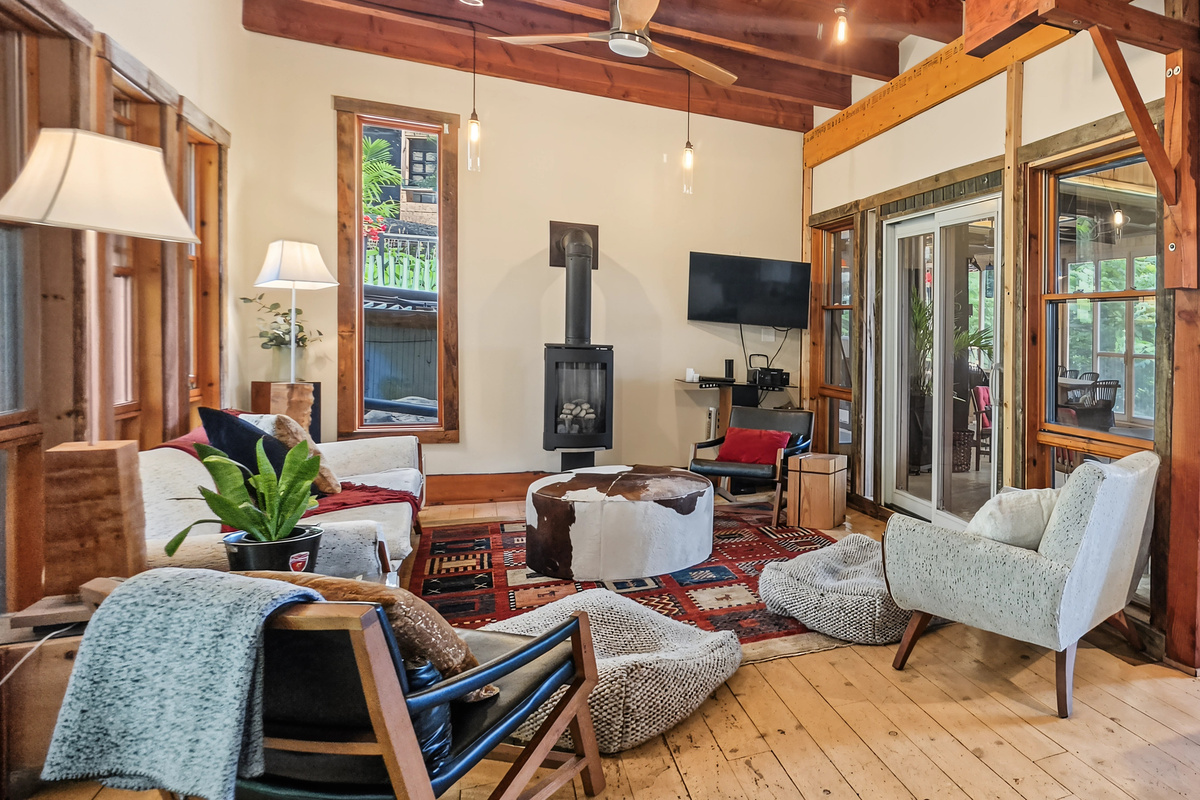 Main cottage living room with smart TV and gas stove