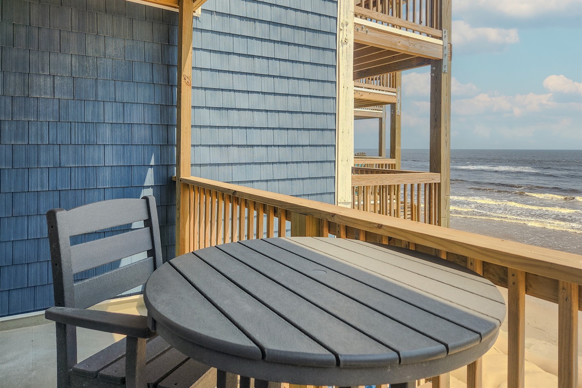 Comfortable bar-height furniture for enjoying the ocean views