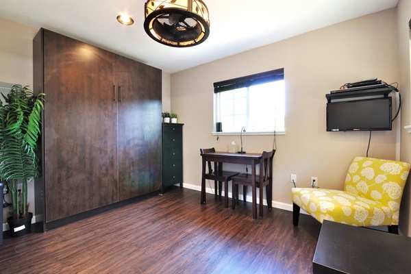 Sunny bedroom w/ plush bed & garden views for slow mornings