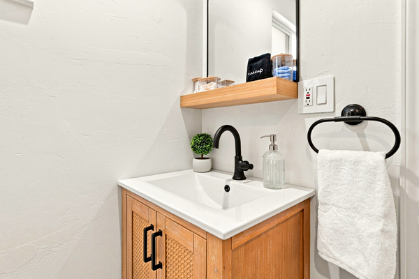 Quaint Bathroom includes cotton, q-tips and make up remover
