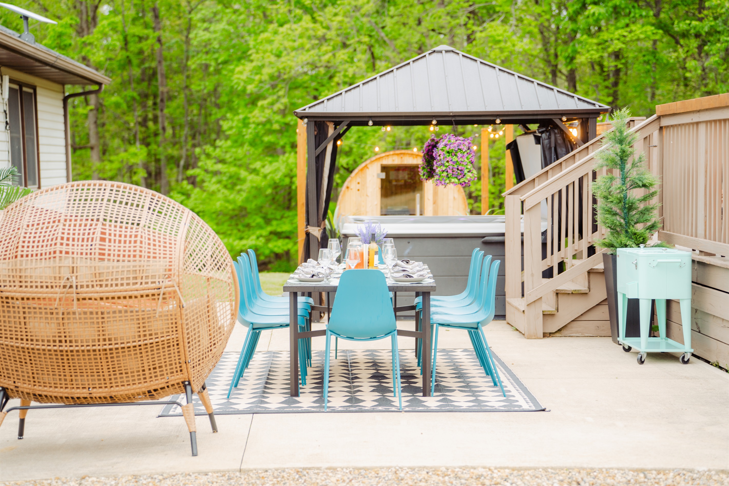 Gather around the table for alfresco dining with a scenic backdrop