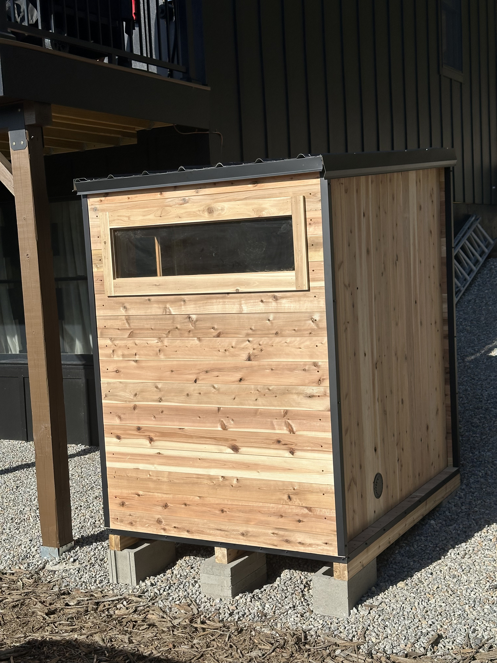 Private outdoor sauna adds another relaxing amenity to your mountain getaway.