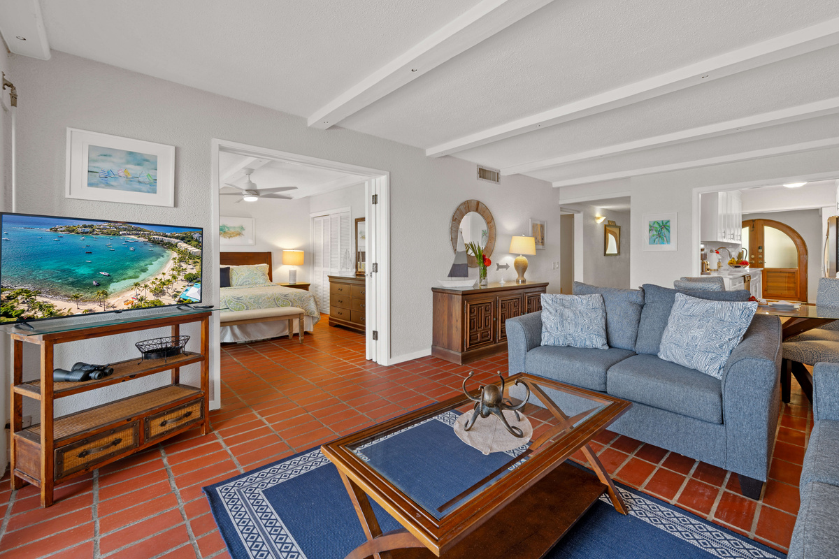 Comfortable seating and an open layout create the perfect space to unwind after a day in paradise.