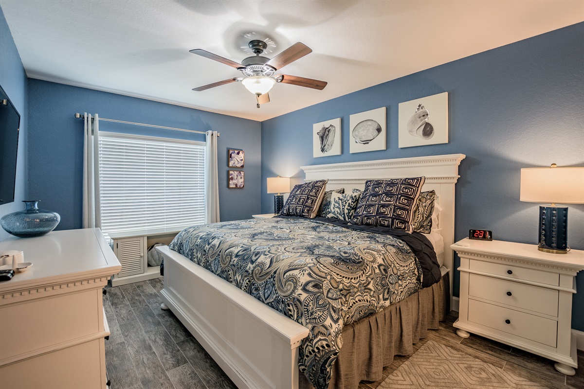 Master suite with king size bed, smart tv and window that overlooks the Intracoastal