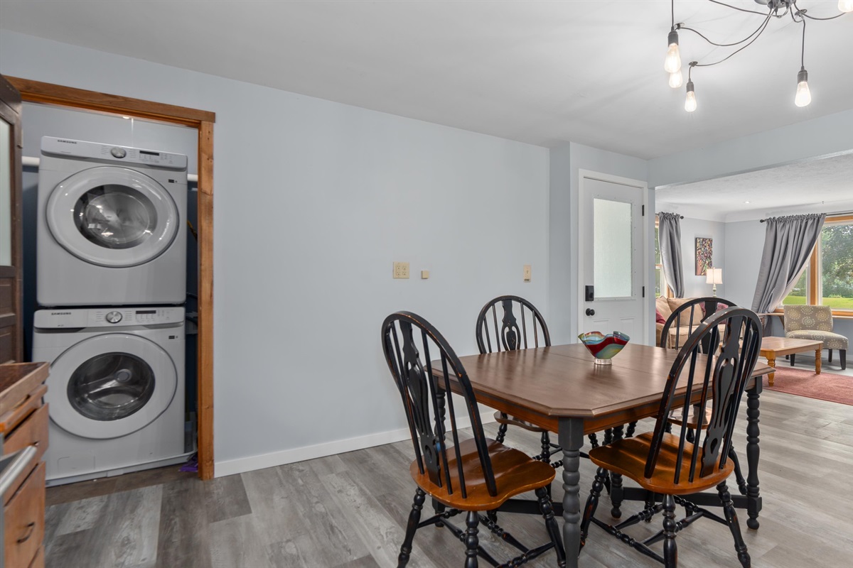 Upstairs dining area with included laundry. 