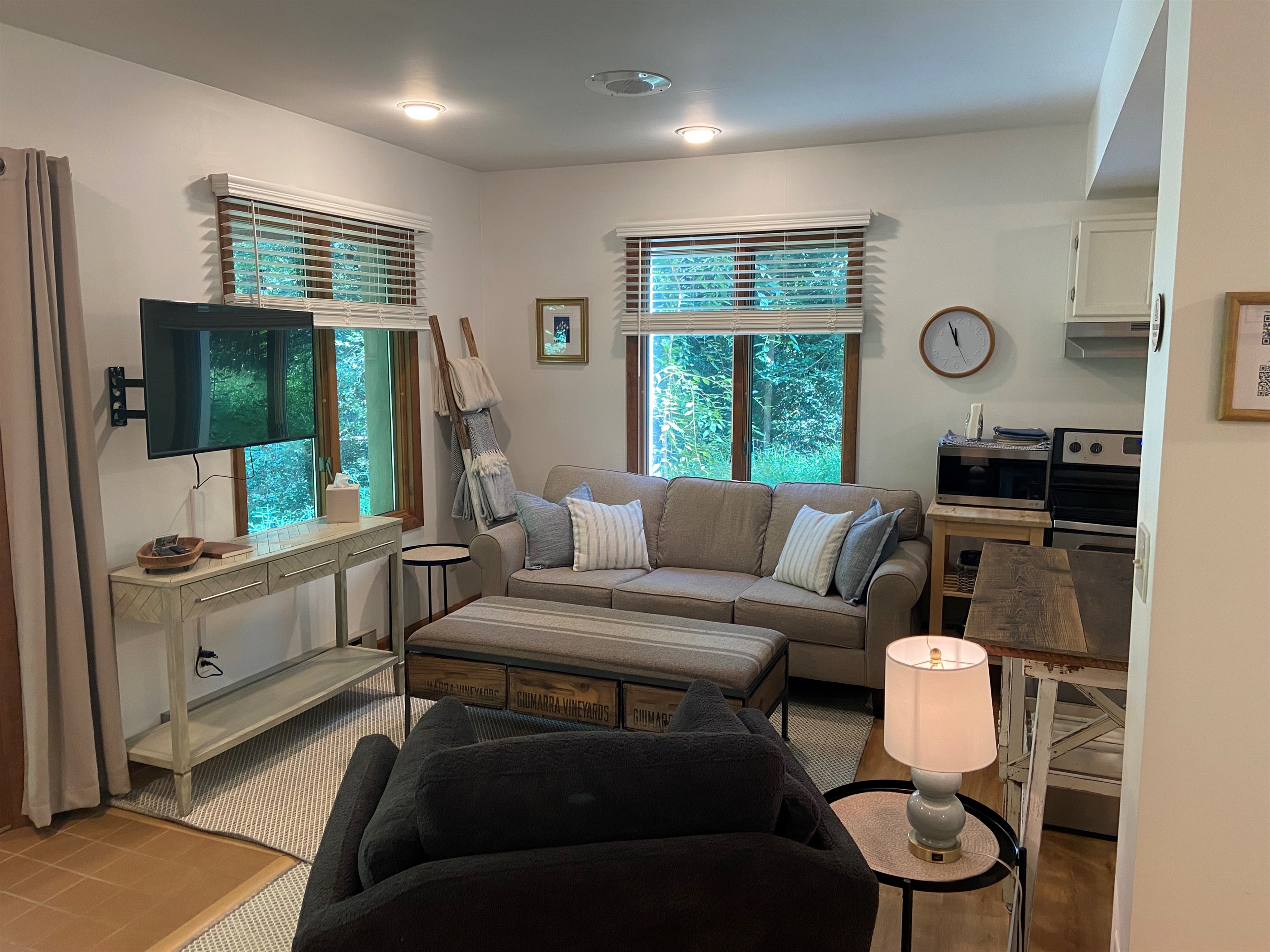 The living room offers a cozy space to spread out and relax.