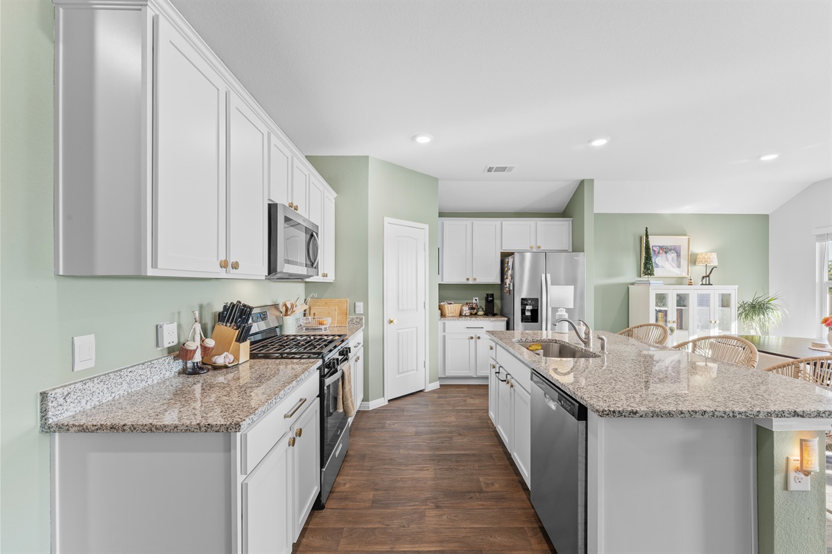 A fully stocked cook's kitchen awaits you with all the pots, pans and utensils you could possibly want.