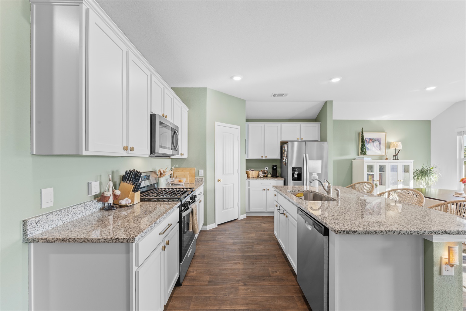 A fully stocked cook's kitchen awaits you with all the pots, pans and utensils you could possibly want.