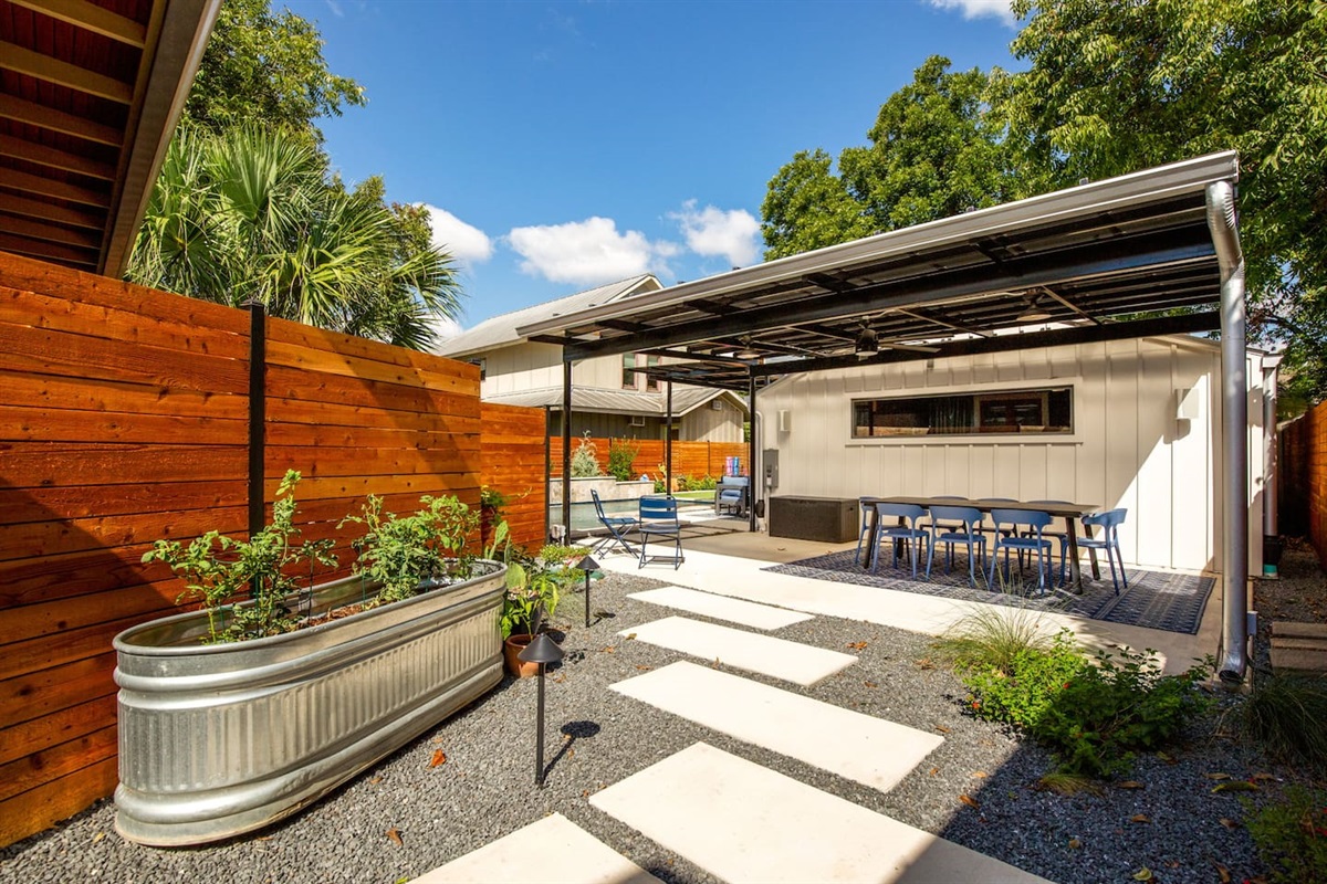 Inviting path leading from the historic street into your private courtyard and heated pool oasis.
