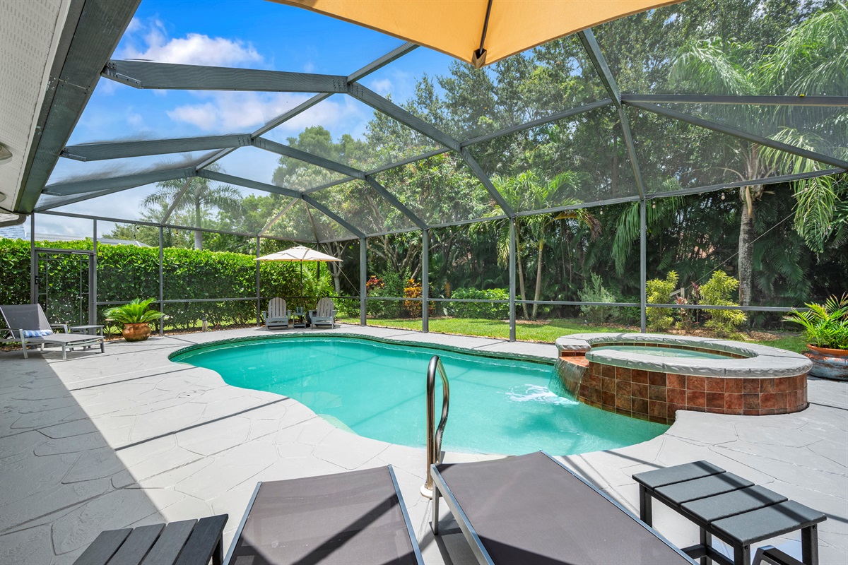 Plunge into this saltwater pool and enjoy a lush tropical landscape in privacy.