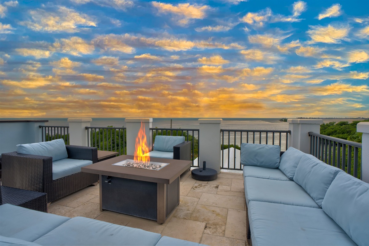Lounge on the rooftop as you watch the sunset.