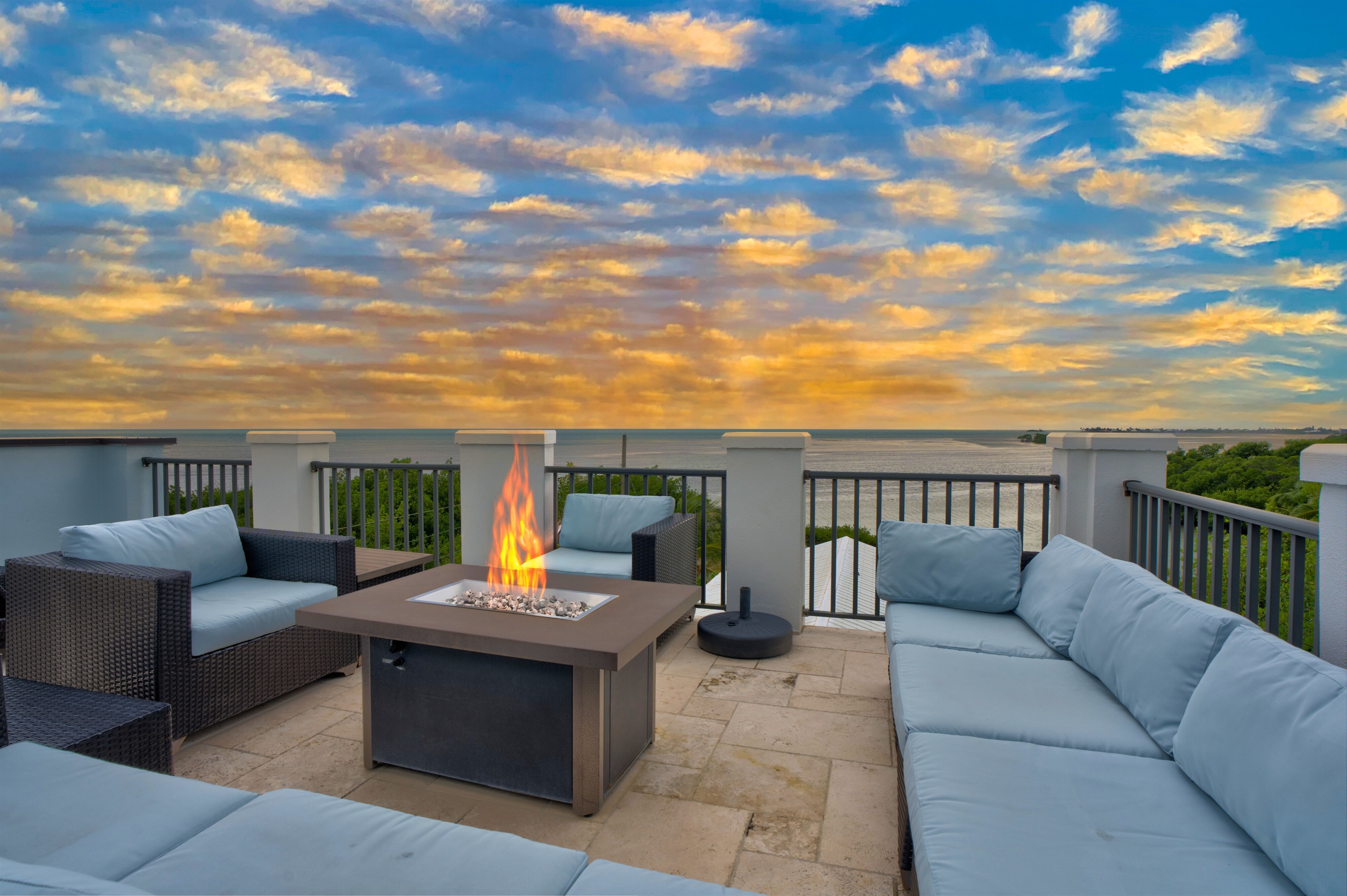 Lounge on the rooftop as you watch the sunset.