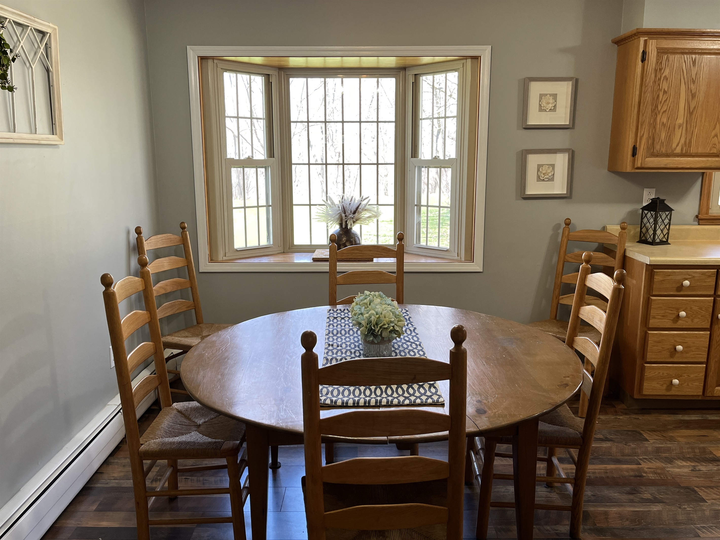 Eat-in kitchen with backyard views