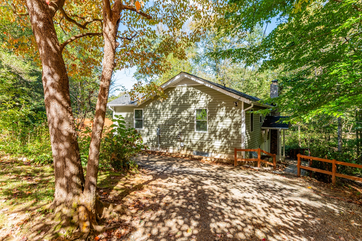 Exterior: Nestled among trees, this home offers serene views and easy access to nature!