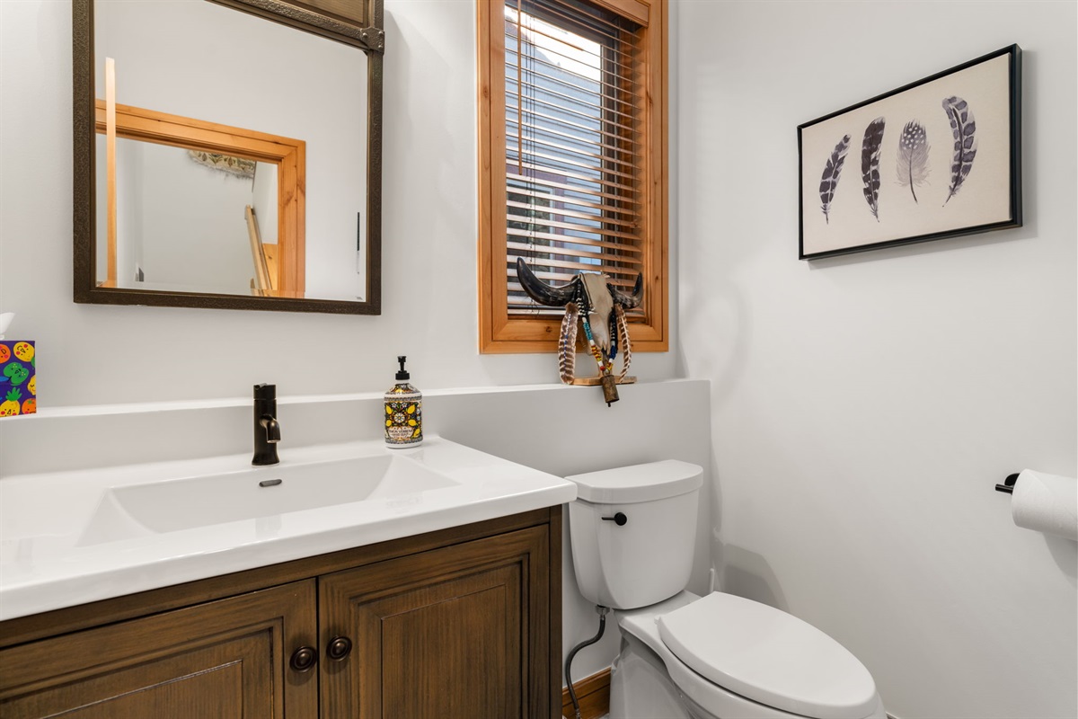 Powder Room on main level by front door.