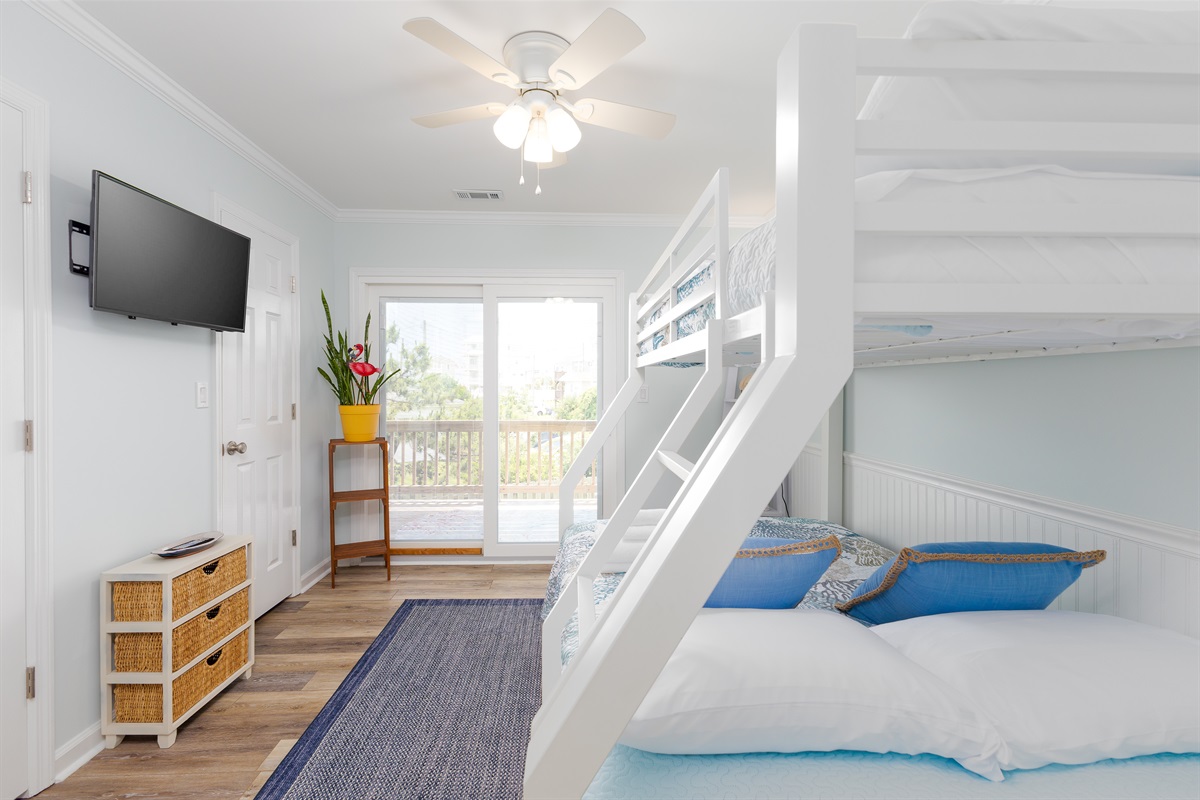 The main floor bedroom provides a comfortable and inviting space