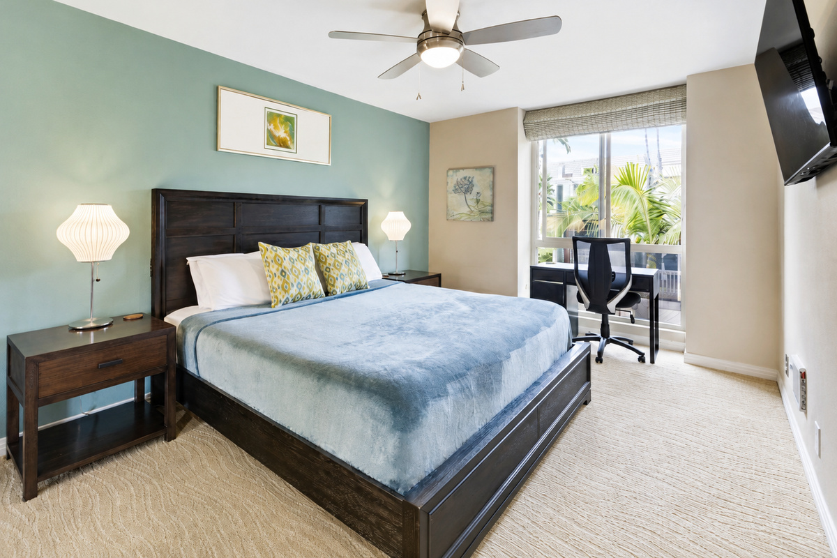 King-size bed with European blackout curtains and built-in charger ports
