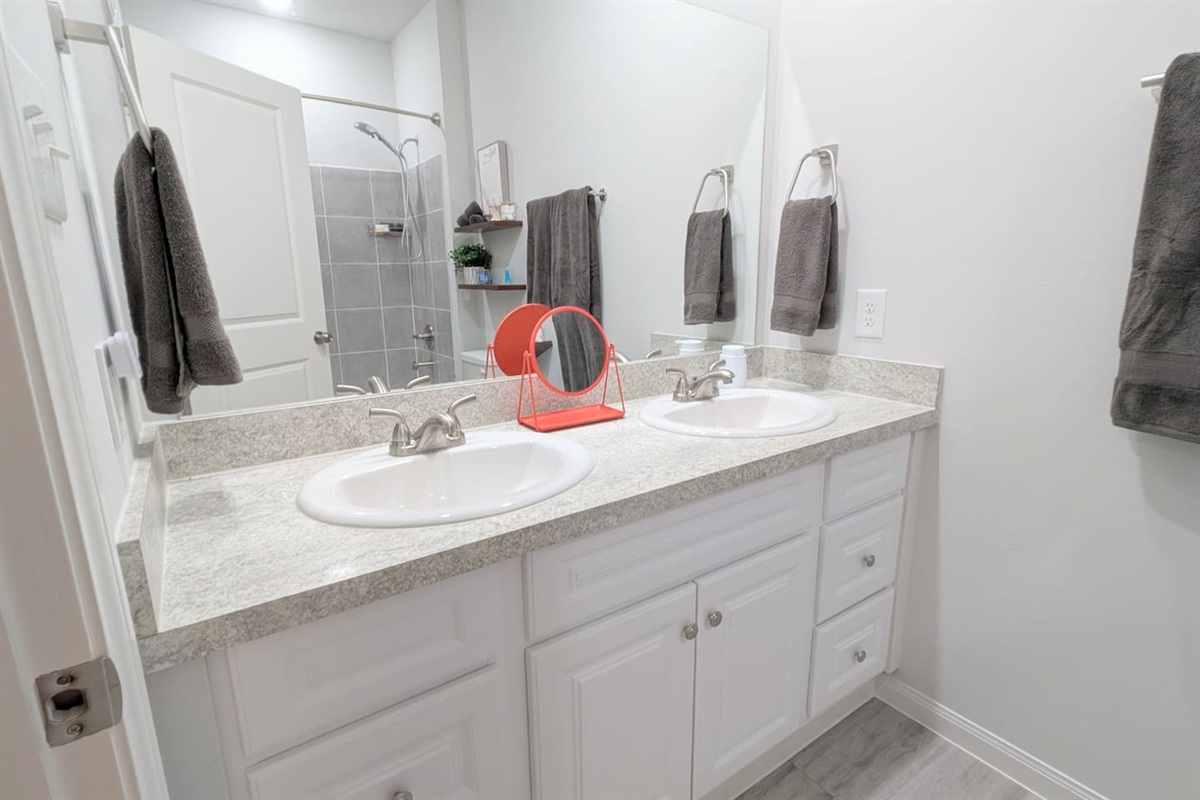 Get ready at this dual vanity with plenty of storage space. 