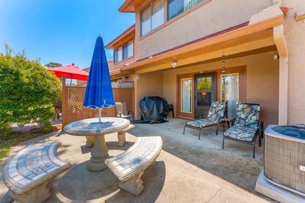 Great covered and uncovered patio with table seating and loungers
