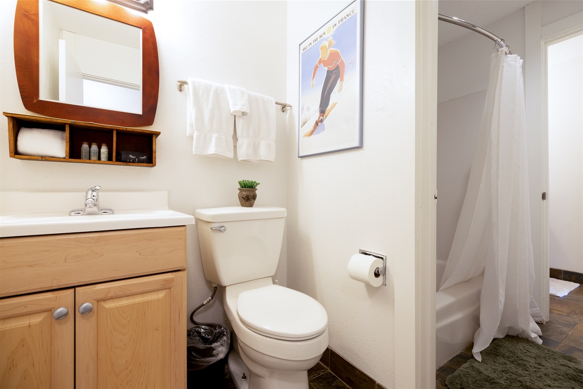 Half bath attached to second full bathroom