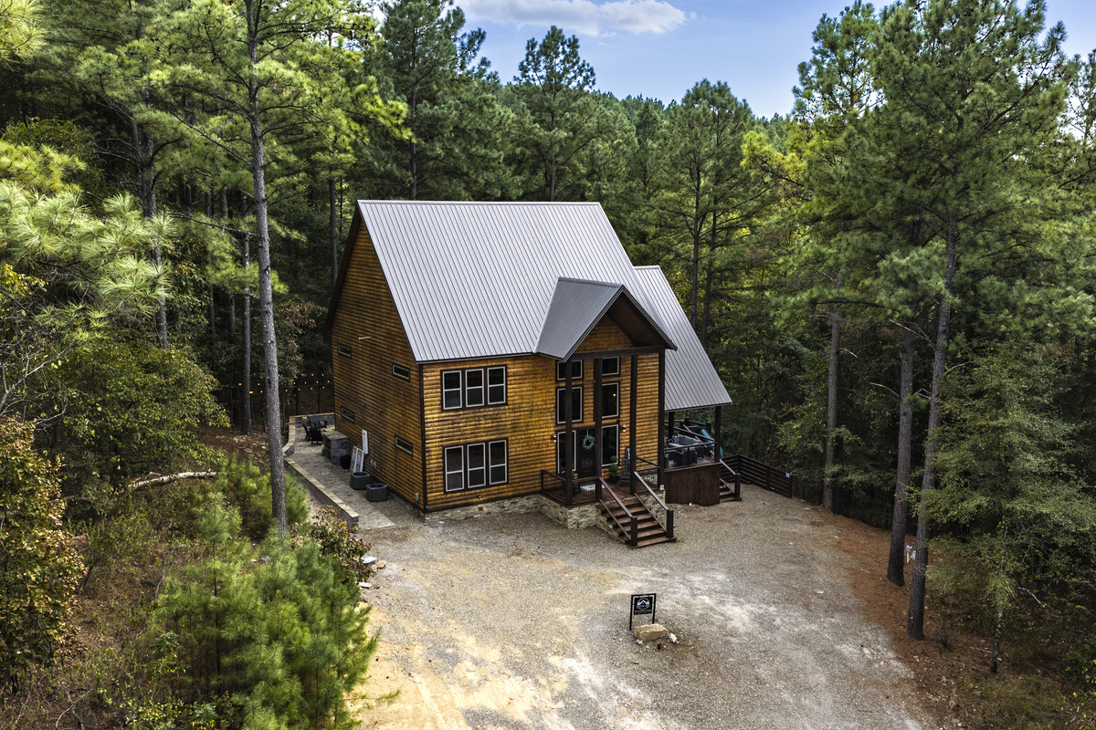 Nestled in the woods, this cozy cabin is the perfect getaway for some much-needed relaxation!