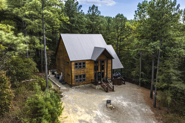 Nestled in the woods, this cozy cabin is the perfect getaway for some much-needed relaxation!