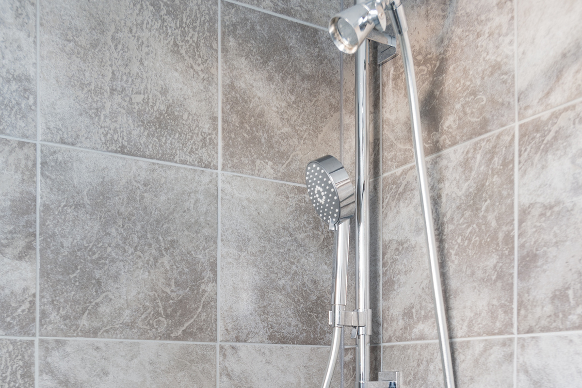 The shower in the upstairs bathroom