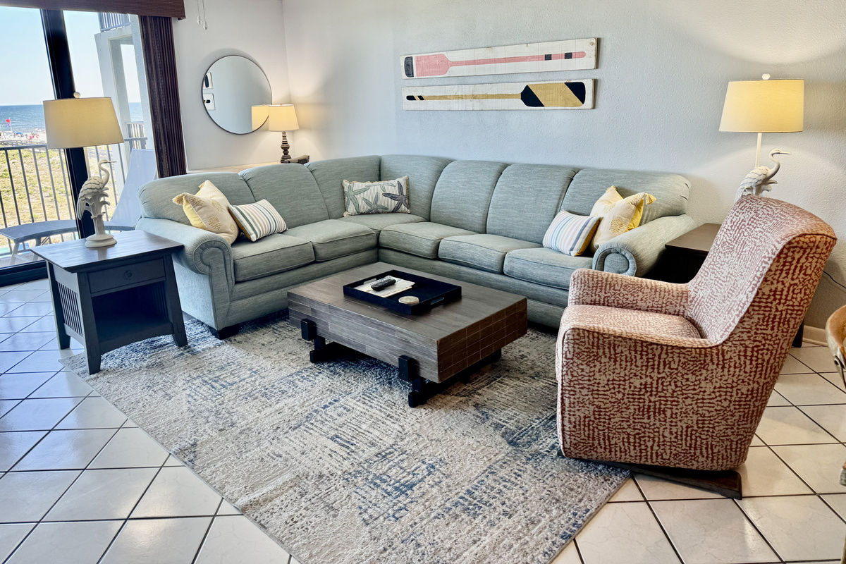 We have a sectional with queen sleeper in the living room!
