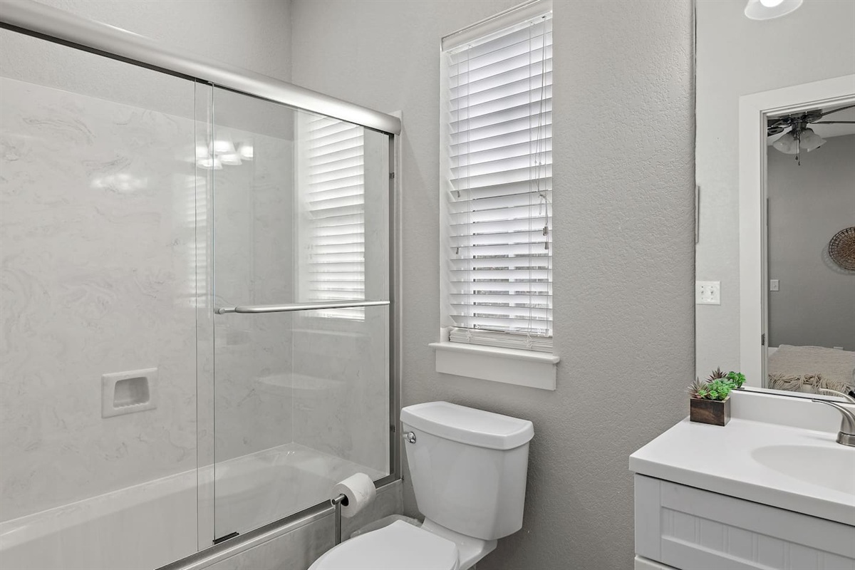 Bathroom #4: Private attached bathroom with shower/tub combo
