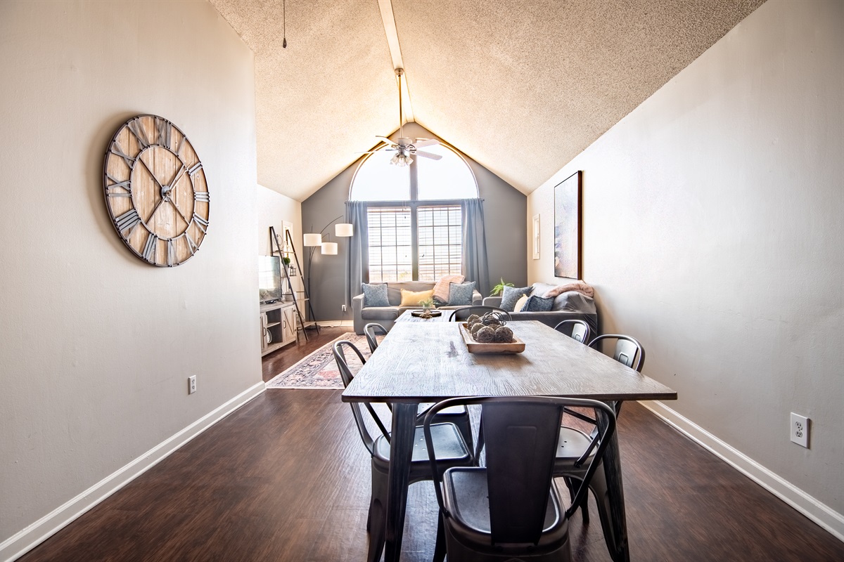 The spacious dining area sits between the kitchen and living room, giving plenty of room to enjoy your favorite meals together or mull over a game of Monopoly.