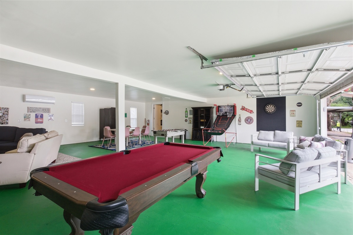 Pool Table and Foosball Table side by side in the Garage Game Room. Two of the best pregame activities under one roof.