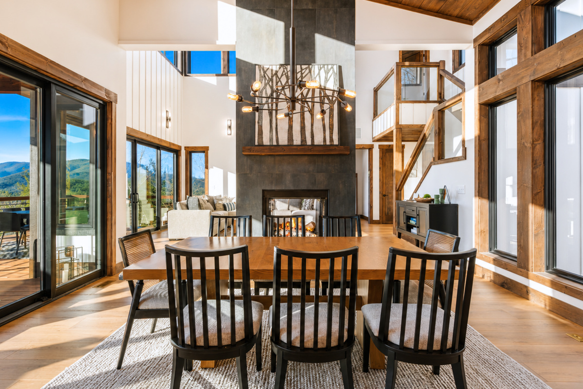 Dinner with firelight and mountains as your backdrop.