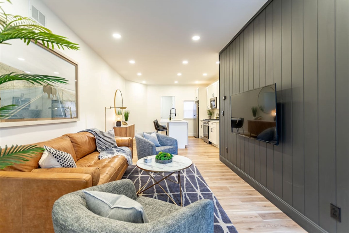 Spacious living area, designed for comfort and relaxation with plenty of seating.