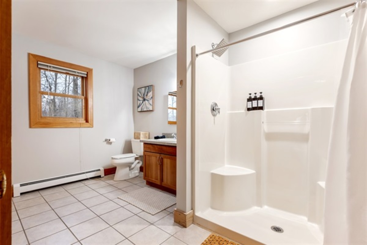 Enjoy a spacious bathroom with a walk in shower that makes mornings smooth even with a full house.
