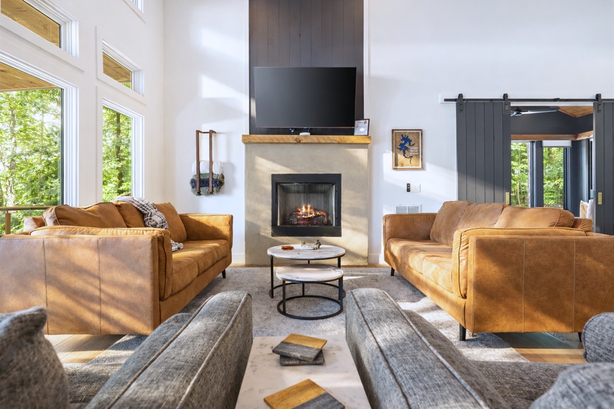 The living room&rsquo;s comfortable seating and warm tones create a cozy spot to unwind after a day of exploring.
*Indoor Fireplace (Seasonal Use October - April)