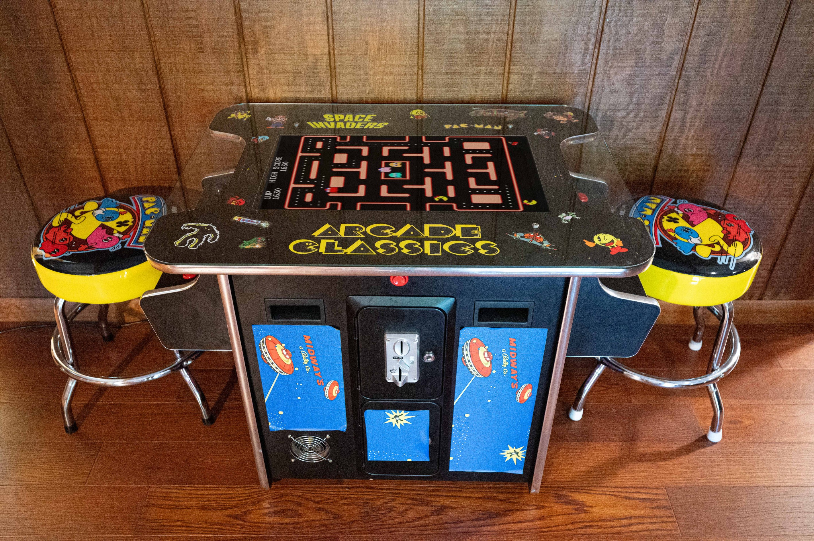 Arcade Lounge: Enjoy endless fun at our classic arcade table—gaming nostalgia awaits!