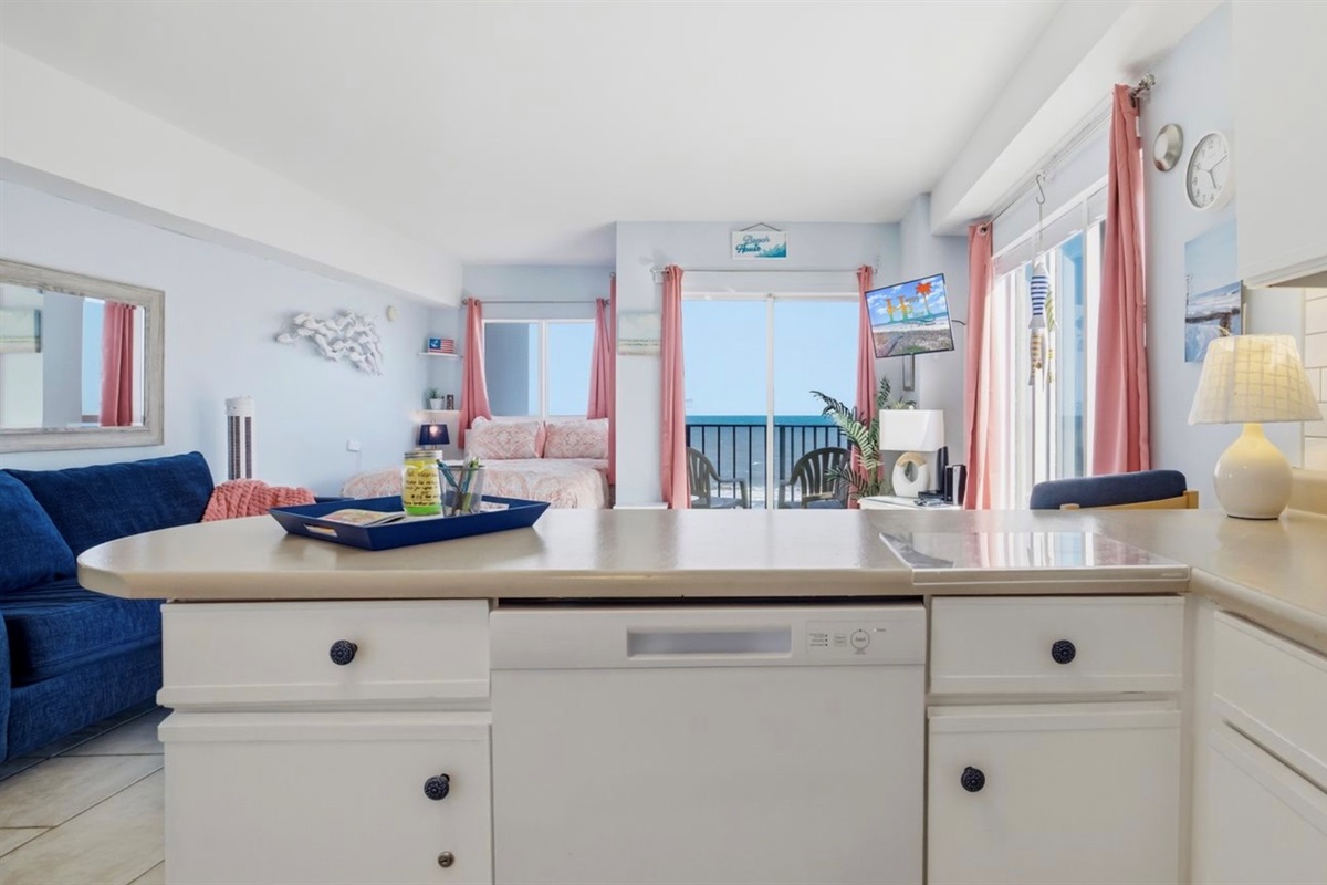 Framed by oceanfront windows, this bright, fully equipped kitchen lets you start the day with coffee and sunrise views — calm, clean, and elevated. ⭐